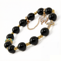 Edgy Obsidian Charm Stretch Bracelet (10mm, ONE SIZE) | Crown + Cross + Butterfly